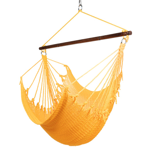 Jumbo Caribbean Hammock Chair in yellow, hand-woven polyester cord with a dark hardwood spreader bar and tasseled ends, on a white background