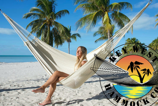 girl in a caribbean hammock at the beach in key west