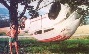 volkswagen beatle suspended in a hammock