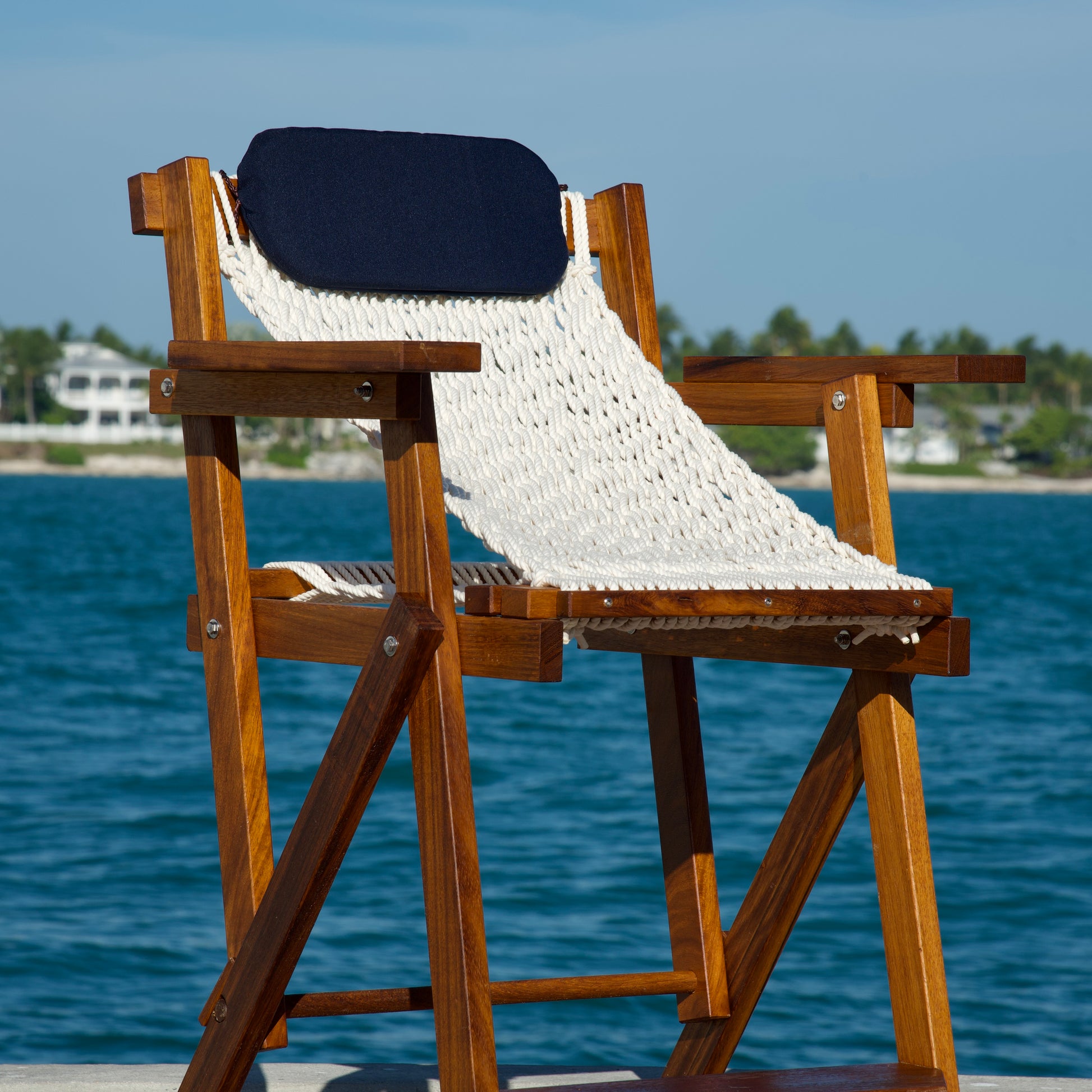 iroko wood bar stool in key west right by the ocean
