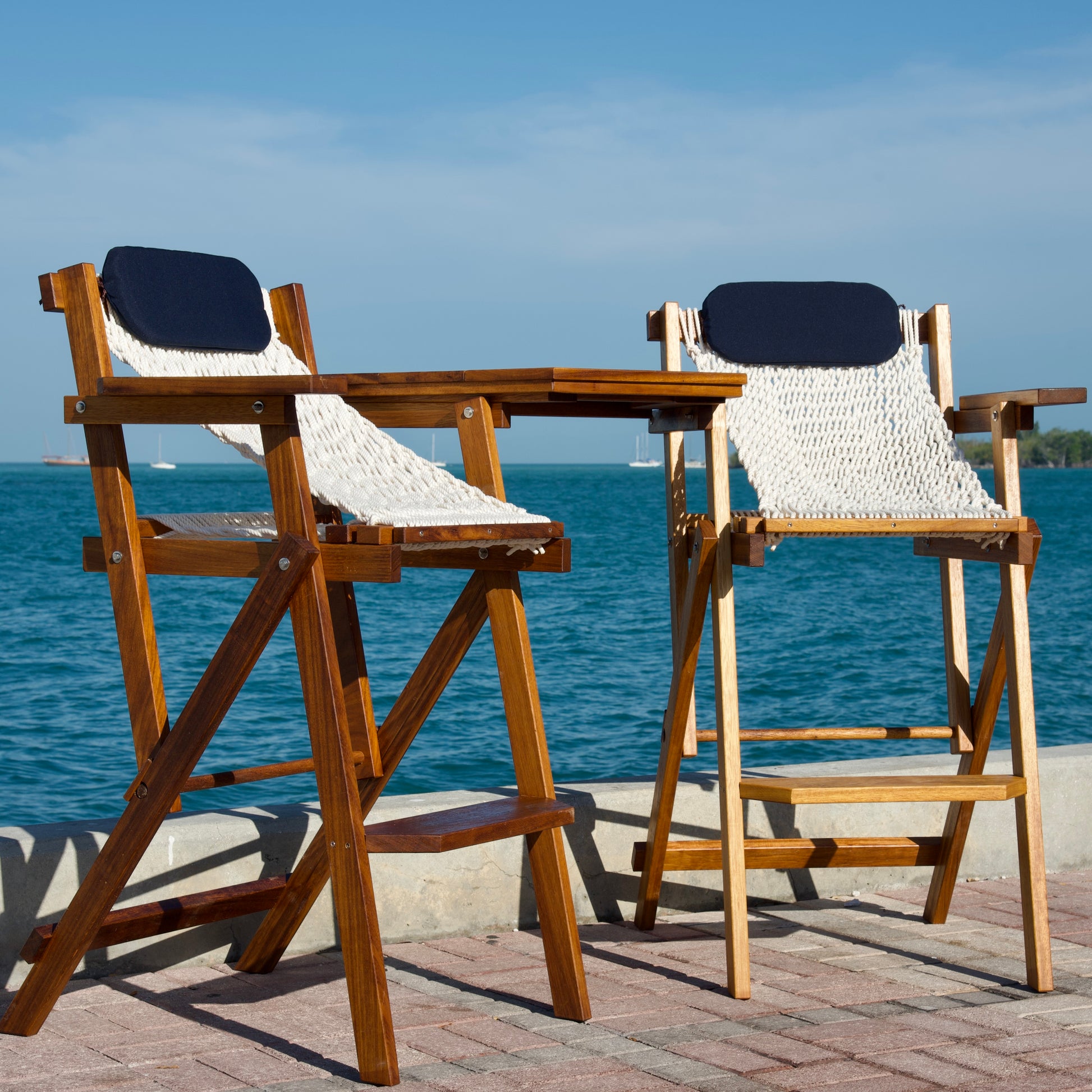 barstools with rope seats and blue pillows