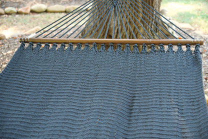 The full hand-woven bed of the Black Double Caribbean Hammock seen end to end