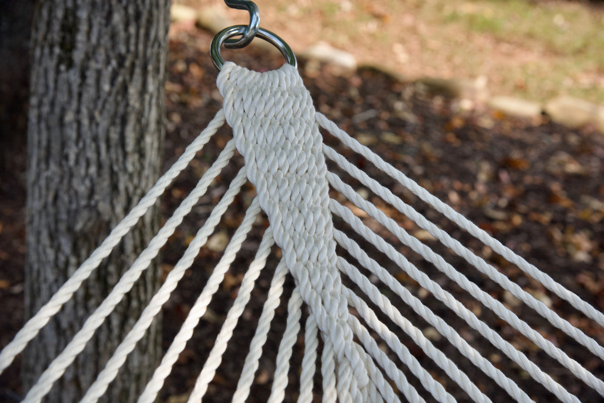 Clew knot on a Cream Double Caribbean Hammock, polyester cords gathered into a stainless steel O-ring