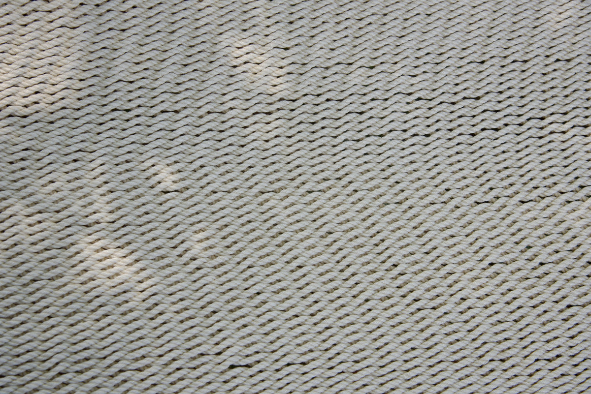 Close-up of the micro-weave polyester bed of the Cream Double Caribbean Hammock