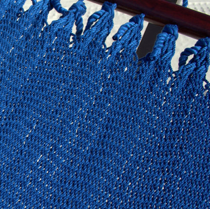 Close-up of the varnished hardwood spreader bar and end cords on the Dark Blue Double Caribbean Hammock