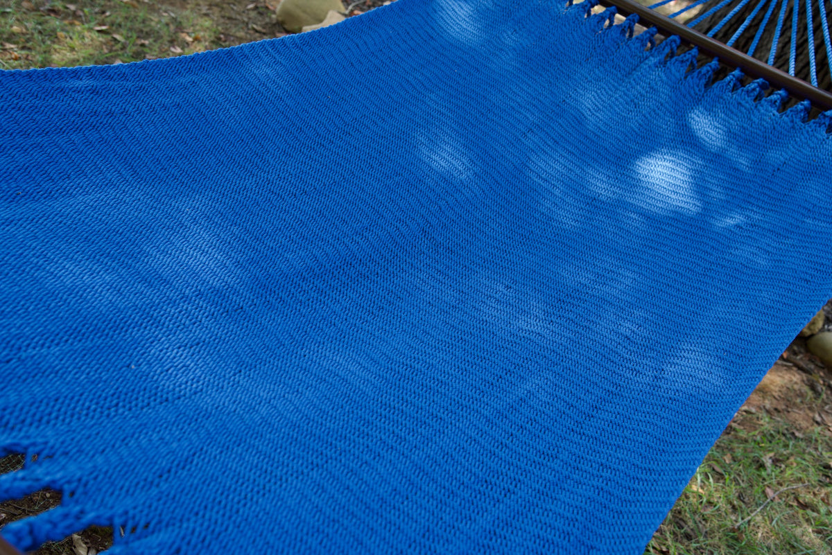 The full hand-woven bed of the Dark Blue Double Caribbean Hammock seen end to end