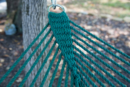 Clew knot on a Green Double Caribbean Hammock, polyester cords gathered into a stainless steel O-ring