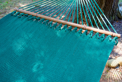 Hardwood spreader bar and fanned end cords on the Green Double Caribbean Hammock
