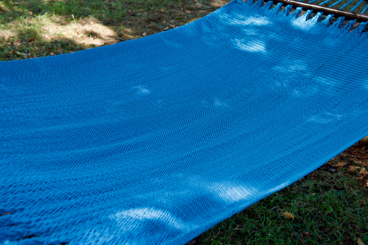 The full hand-woven bed of the Light Blue Double Caribbean Hammock seen end to end