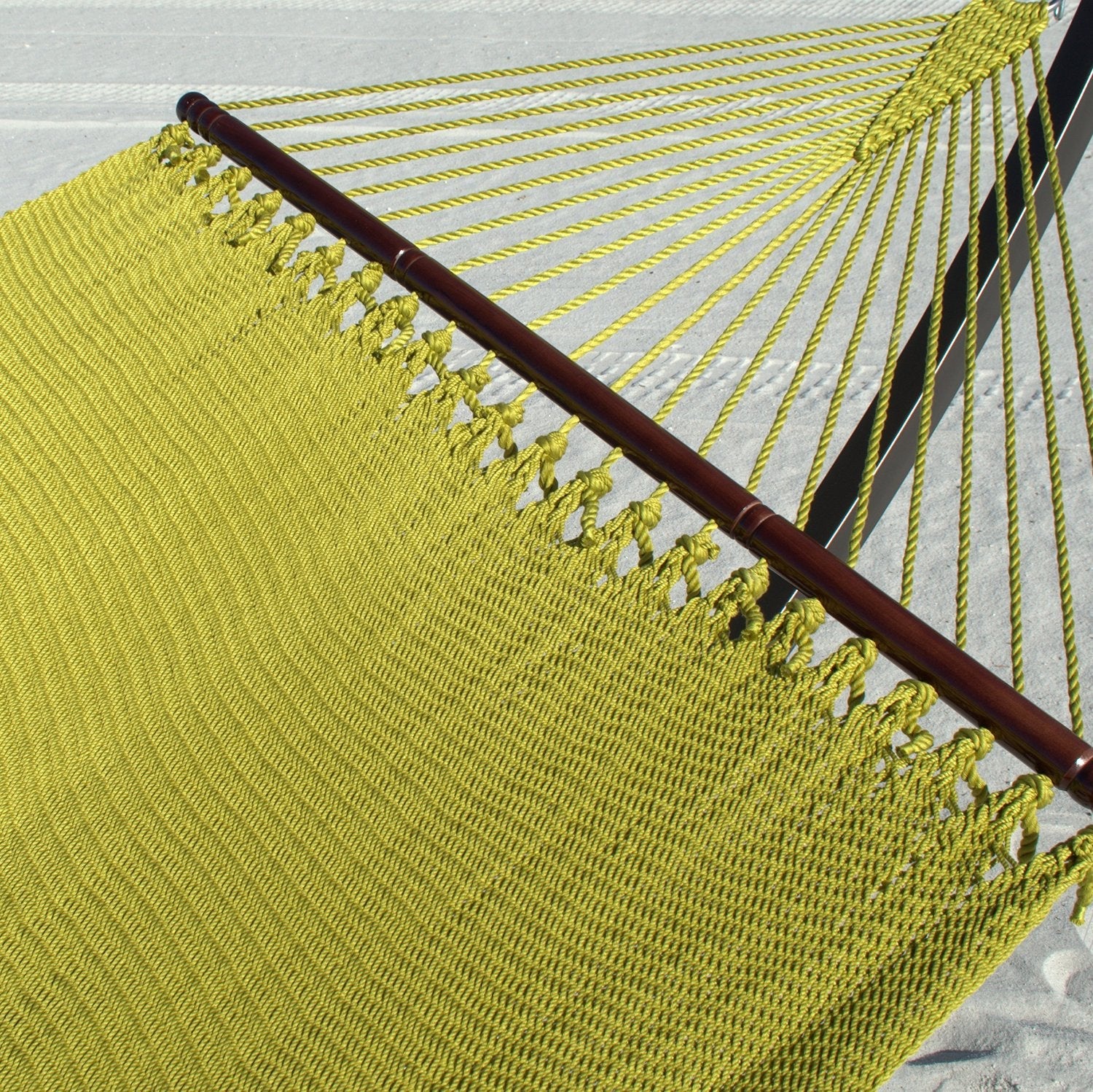 Close-up of the varnished hardwood spreader bar and end cords on the Olive Double Caribbean Hammock