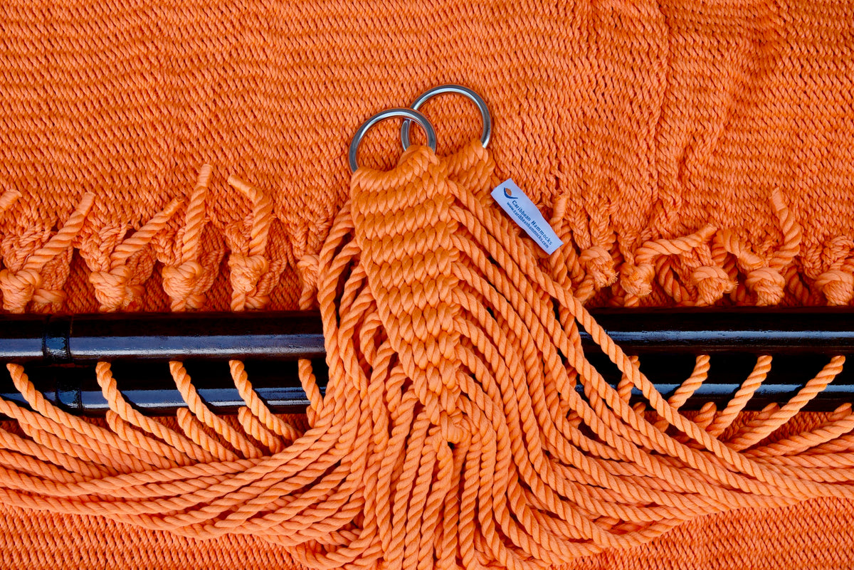 Stainless steel hanging rings, polyester end cords, and clew knot on an Orange Double Caribbean Hammock