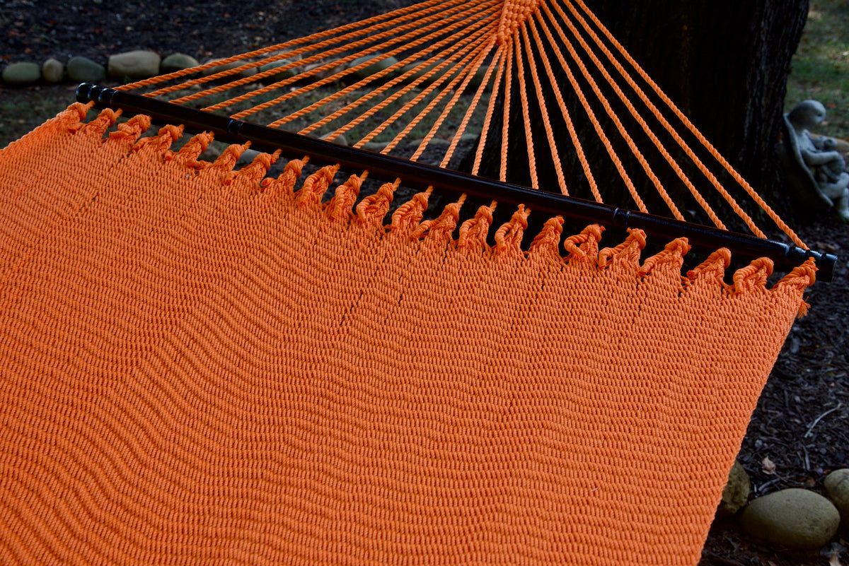 Hardwood spreader bar and fanned end cords on the Orange Double Caribbean Hammock