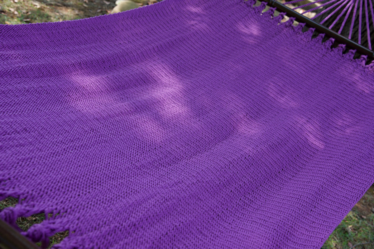 The full hand-woven bed of the Purple Double Caribbean Hammock seen end to end