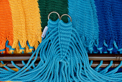 Stainless steel hanging rings, light blue end cords, and clew knot on a Rainbow Double Caribbean Hammock