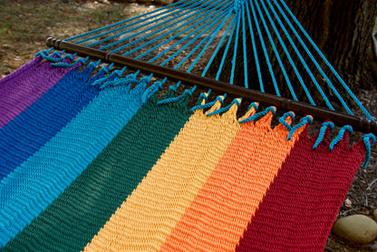 Hardwood spreader bar and fanned light blue end cords on the Rainbow Double Caribbean Hammock