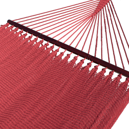 Red Double Caribbean Hammock with its 48-inch hardwood spreader bar and fanned end cords