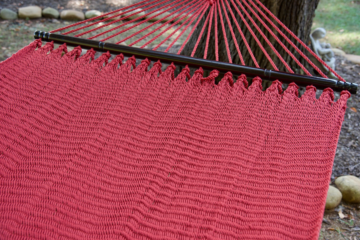 Hardwood spreader bar and fanned end cords on the Red Double Caribbean Hammock