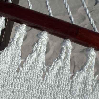 Close-up of the end cords gathered beneath the spreader bar on the White Double Caribbean Hammock
