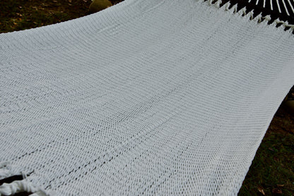 The full hand-woven bed of the White Double Caribbean Hammock seen end to end