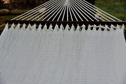 End cords fanning above the hardwood spreader bar of the White Double Caribbean Hammock