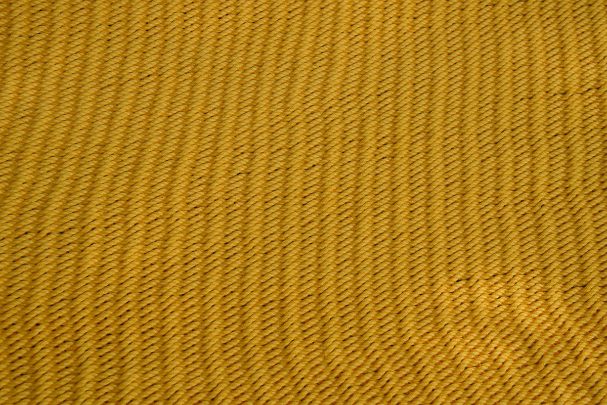 Close-up of the micro-weave polyester bed of the Yellow Double Caribbean Hammock