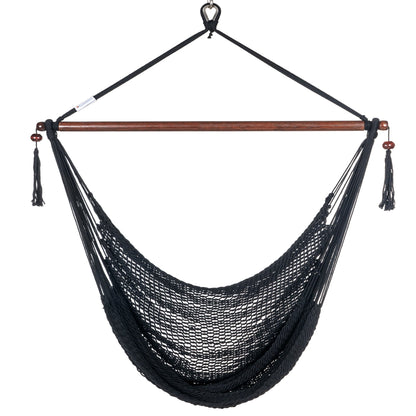 Front view of a black Island Haven hammock chair showing the deep open-weave seat and built-in footrest, on a white background