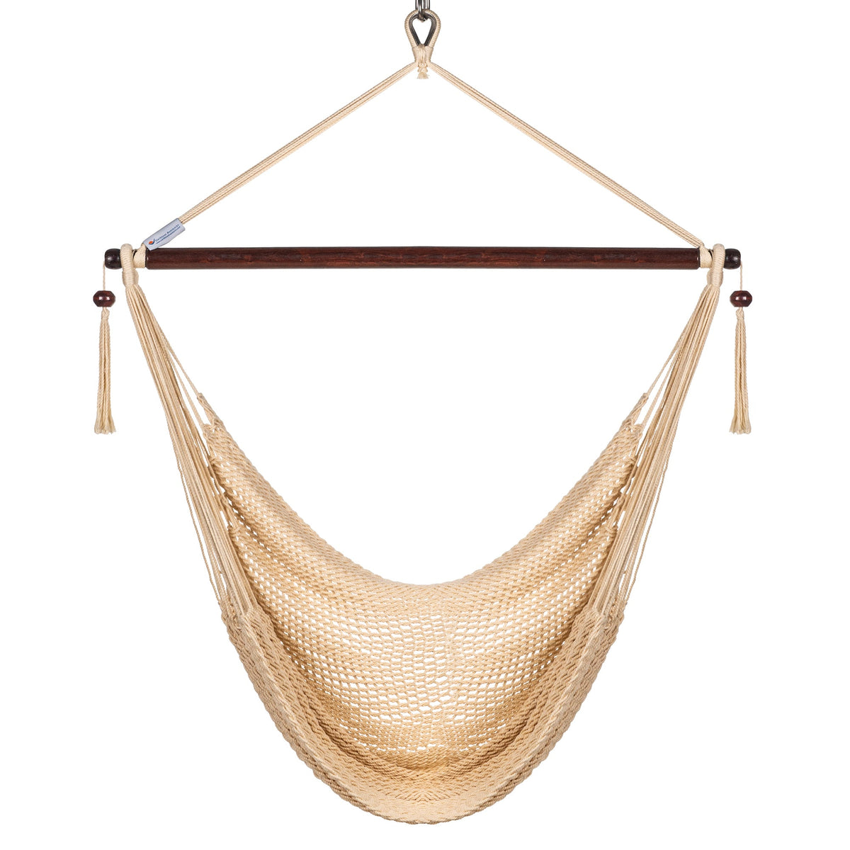 Front view of a cream Island Haven hammock chair showing the deep open-weave seat and built-in footrest, on a white background