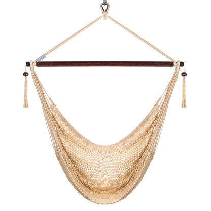 Front view of a cream Island Haven hammock chair showing the deep open-weave seat and built-in footrest, on a white background