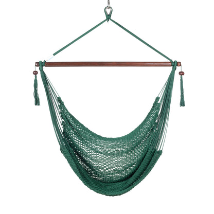Front view of a green Island Haven hammock chair showing the deep open-weave seat and built-in footrest, on a white background