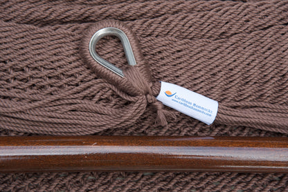 Close-up of the sewn brand label and zinc-plated ring at the seat edge of a mocha Island Haven hammock chair