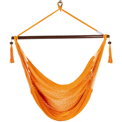 Front view of an orange Island Haven hammock chair showing the deep open-weave seat and built-in footrest, on a white background