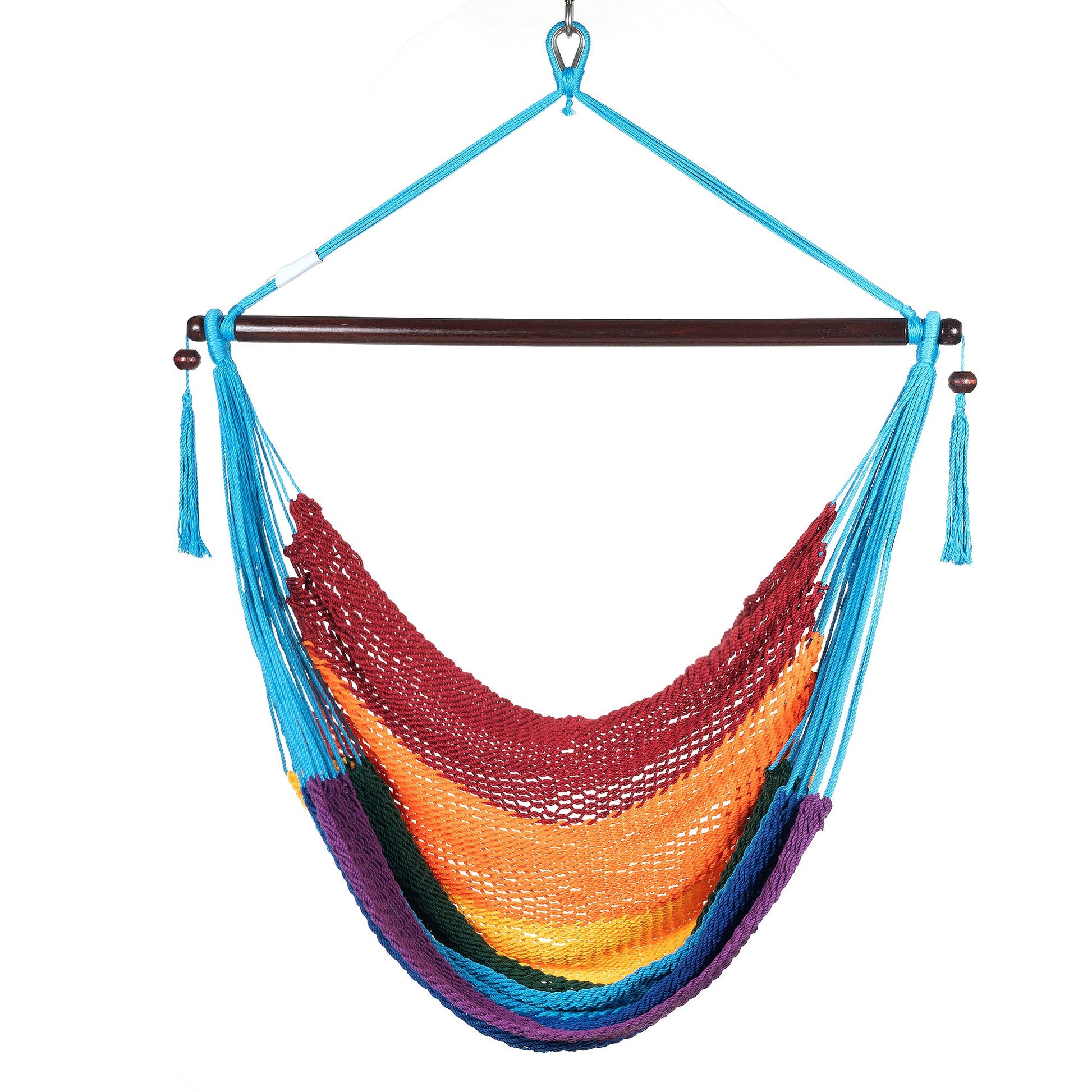 Front view of a rainbow-striped Island Haven hammock chair showing the deep open-weave seat and built-in footrest, on a white background