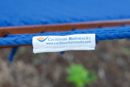 Caribbean Hammocks label on the end cord of a dark blue Island Oasis hammock