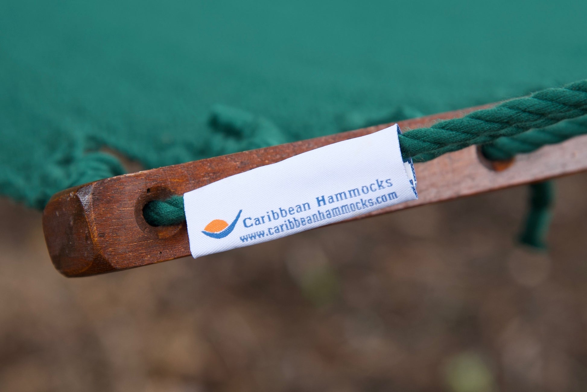 Caribbean Hammocks label on the end cord of a green Island Oasis hammock