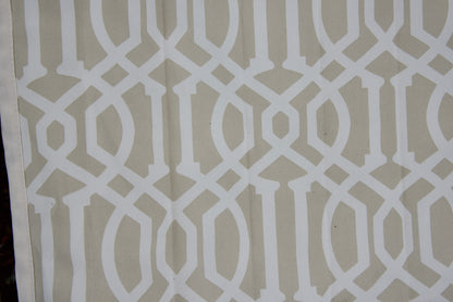 Close-up of the beige pattern Jacquard-woven polyester bed on an Island Tranquility hammock, white trellis print