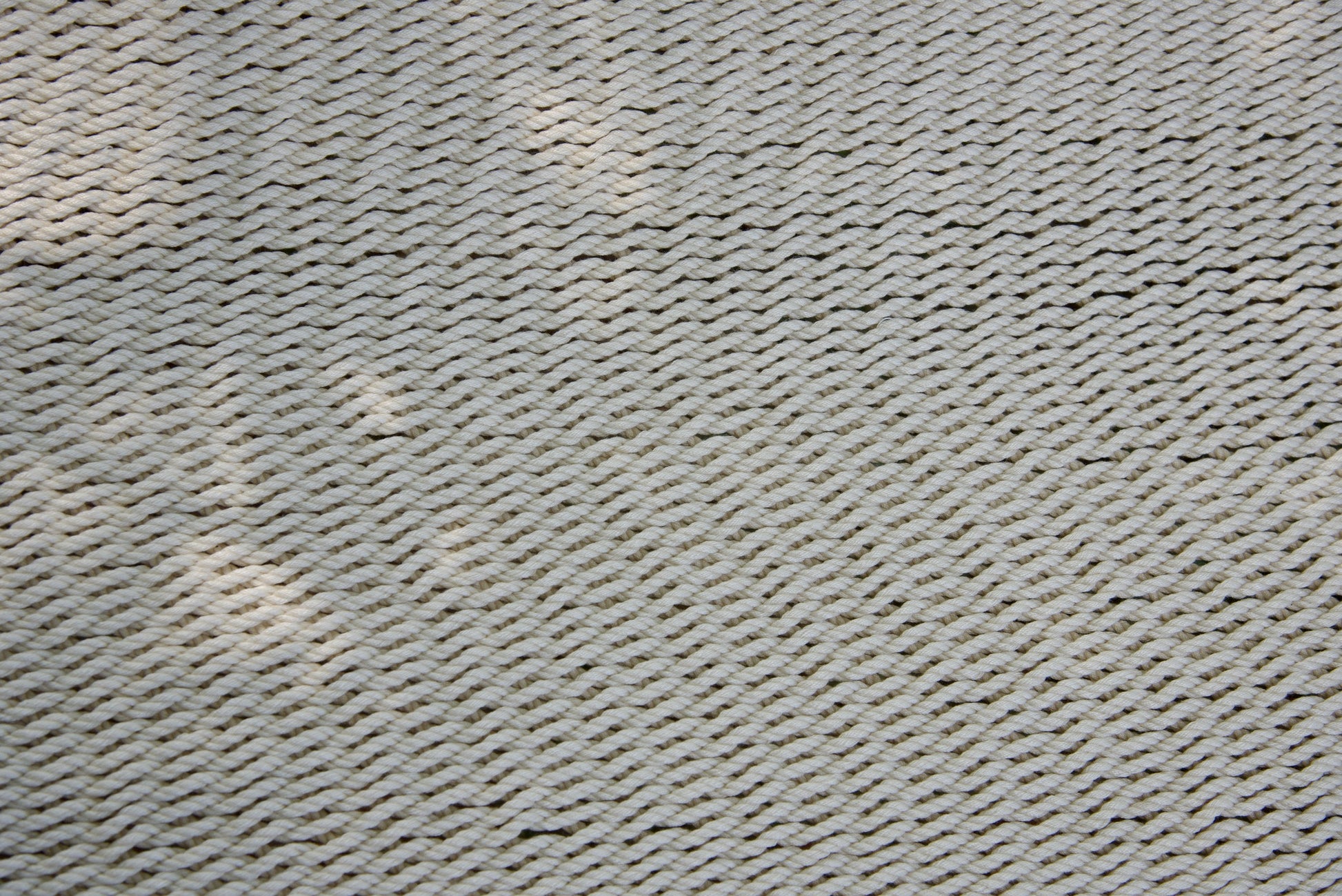 Close-up of the micro-weave polyester bed of the Cream Jumbo Caribbean Hammock