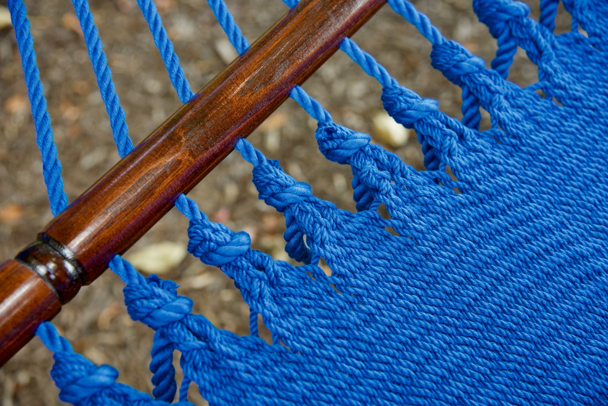 Macro view of the knotted edge loops at the spreader bar of the Dark Blue Jumbo Caribbean Hammock