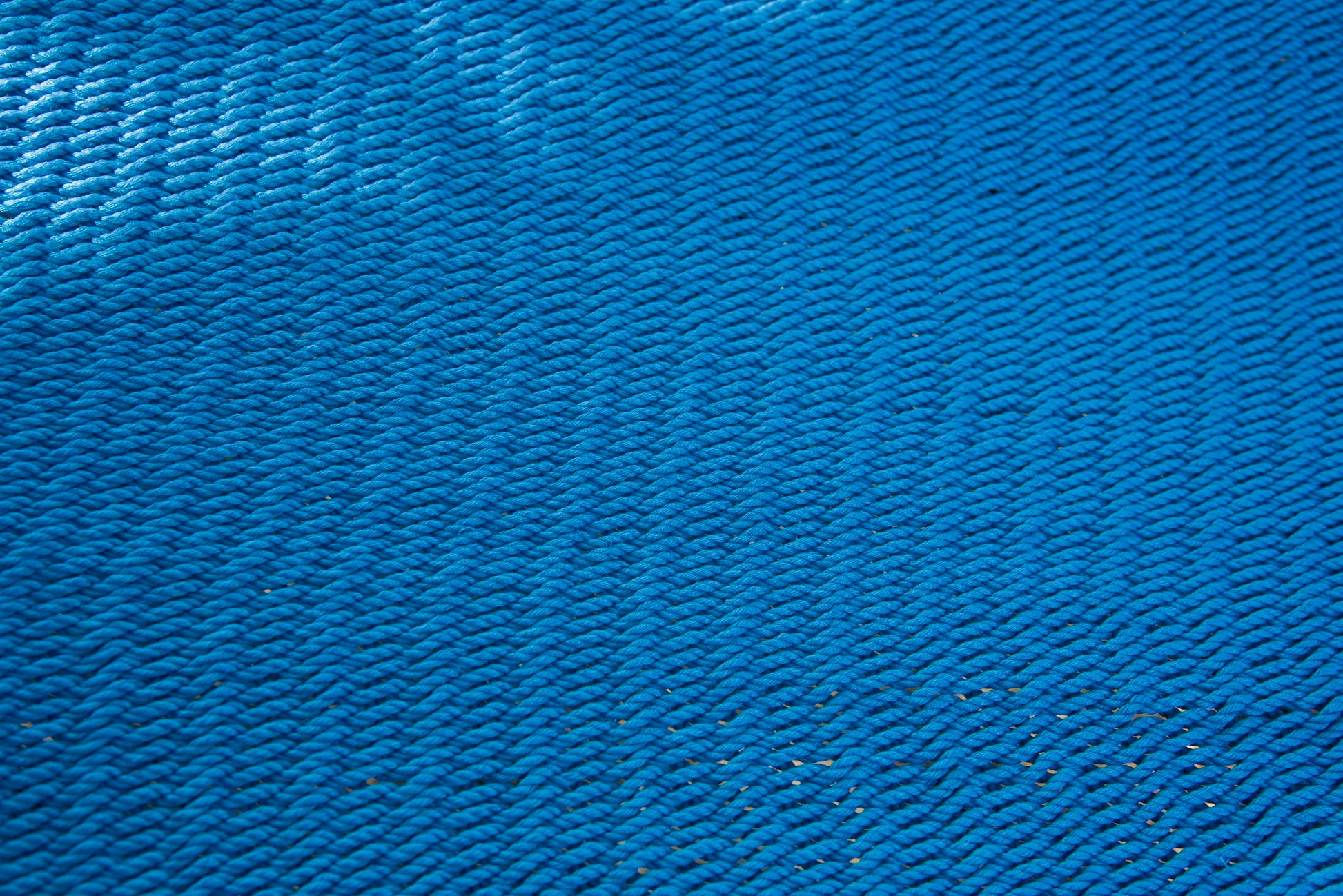 Close-up of the micro-weave polyester bed of the Light Blue Jumbo Caribbean Hammock