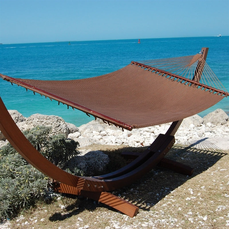 Mocha Jumbo Caribbean Hammock hanging on the Wood Arc Hammock Stand