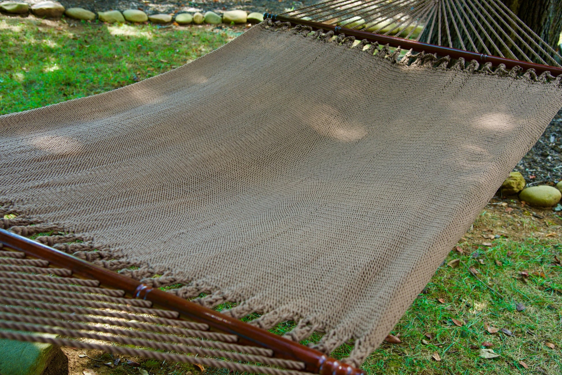 The full hand-woven bed of the Mocha Jumbo Caribbean Hammock seen end to end