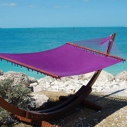 Purple Jumbo Caribbean Hammock hanging on the Wood Arc Hammock Stand