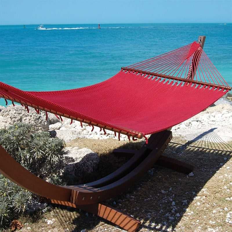 Red Jumbo Caribbean Hammock hanging on the Wood Arc Hammock Stand
