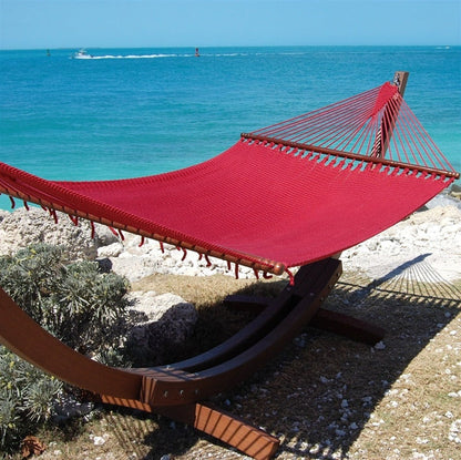 Red Jumbo Caribbean Hammock hanging on the Wood Arc Hammock Stand