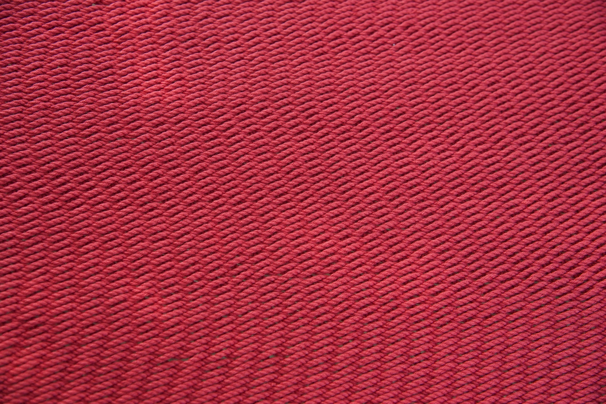 Close-up of the micro-weave polyester bed of the Red Jumbo Caribbean Hammock
