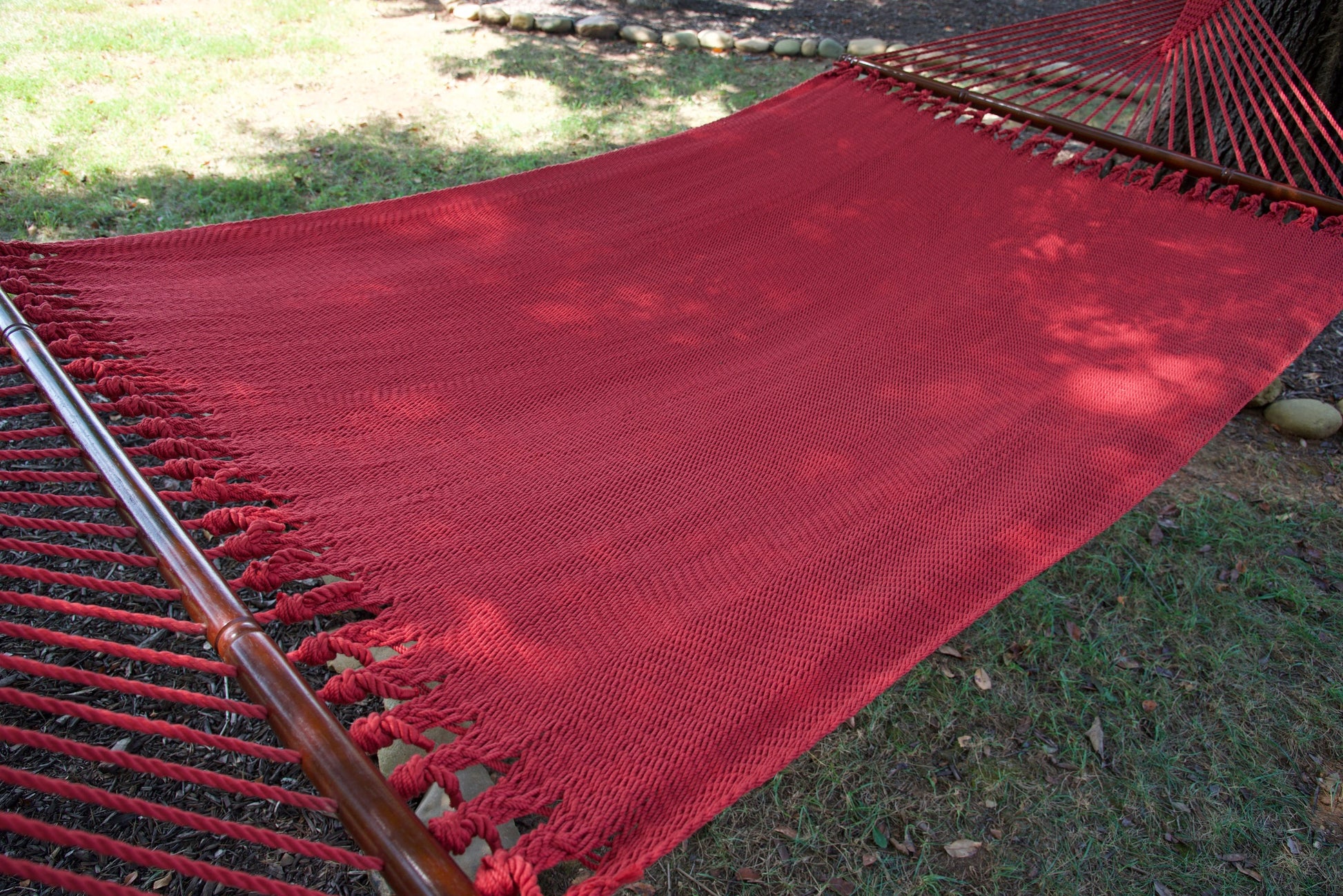 The full hand-woven bed of the Red Jumbo Caribbean Hammock seen end to end