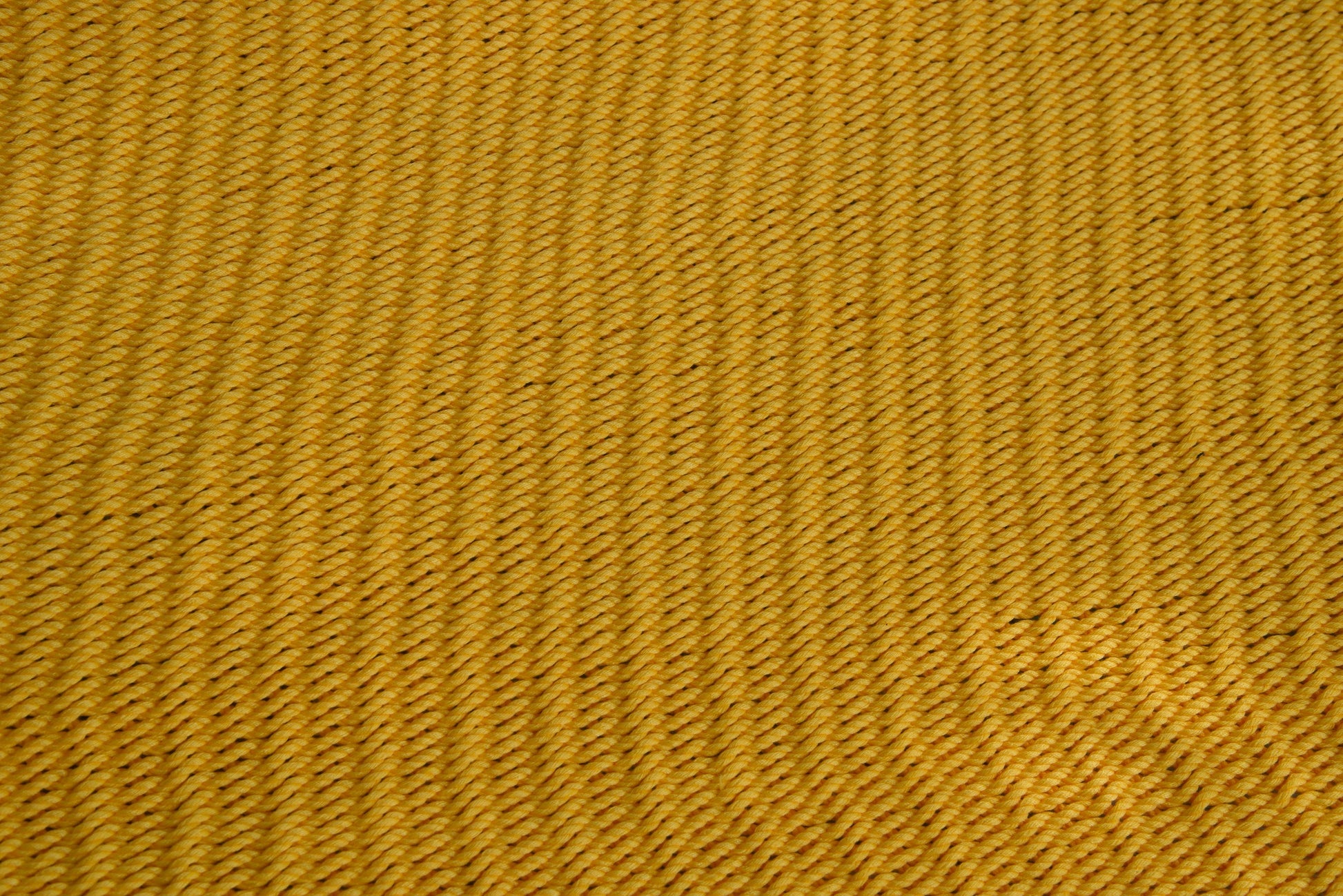 Close-up of the micro-weave polyester bed of the Yellow Jumbo Caribbean Hammock