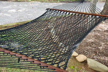 Close view of the Black polyester rope bed and wood spreader bar of the Jumbo Rope Hammock.