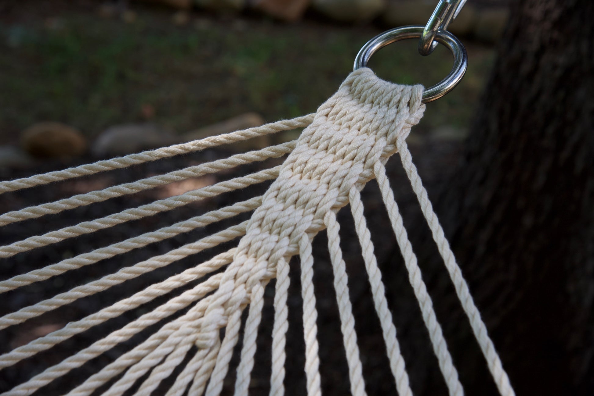Close view of the O-ring and gathered Cream end cords of the Jumbo Rope Hammock.