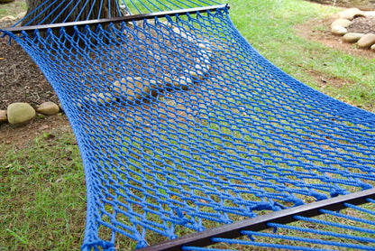 Close view of the Dark Blue polyester rope bed and wood spreader bar of the Jumbo Rope Hammock.