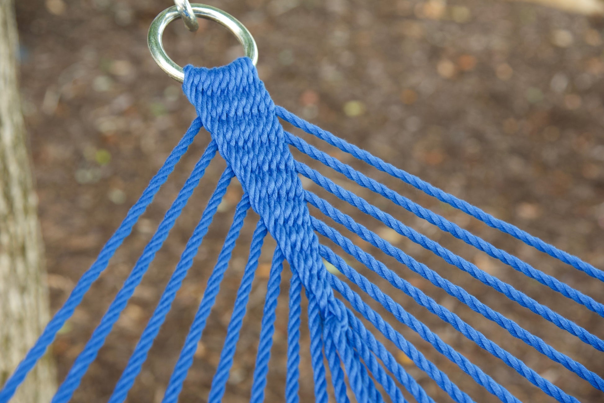 Close view of the O-ring and gathered Dark Blue end cords of the Jumbo Rope Hammock.